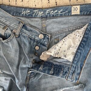We The Free Light Wash Distressed High-Rise Denim Shorts with Floral Pocket